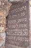 "[Here lies] an important and modest [woman, the married] Nehama Grunce daughter of R. Szmuel and(?) Masze Ajtkes(?)/ from Osze Aitkes, wife of R. Szmuel Loszczanski oszczanski. She died on the eve of the Holy Sabbath 1 Tevet 5694 [29 December 1933]. May her soul be bound in the bond of everlasting life." (szpekh@cwu.edu)